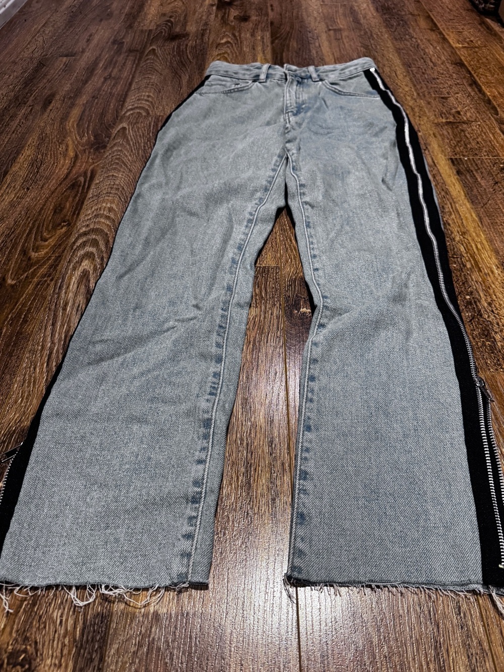 The raggest priest straight leg jeans with black trim and zipper size 24